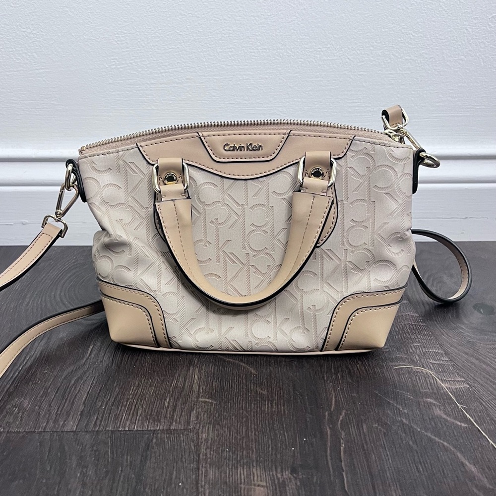 Calvin Klein tan monogram cross body purse